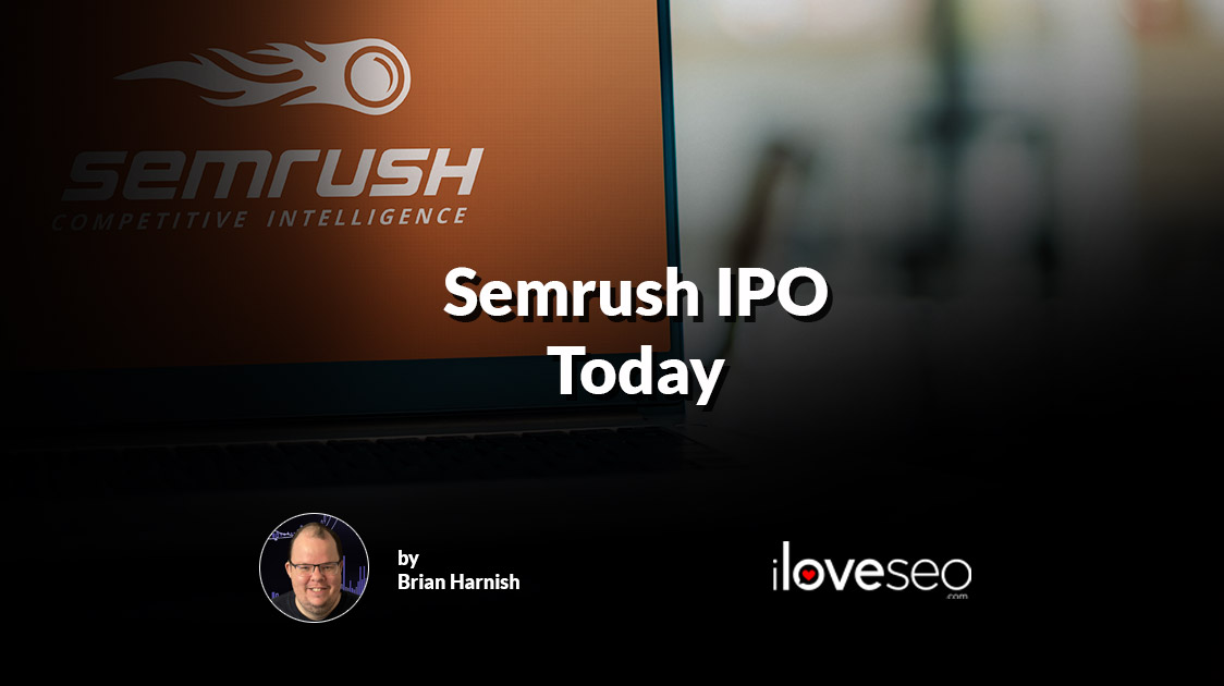 Photography showing Semrush logo displayed on a laptop